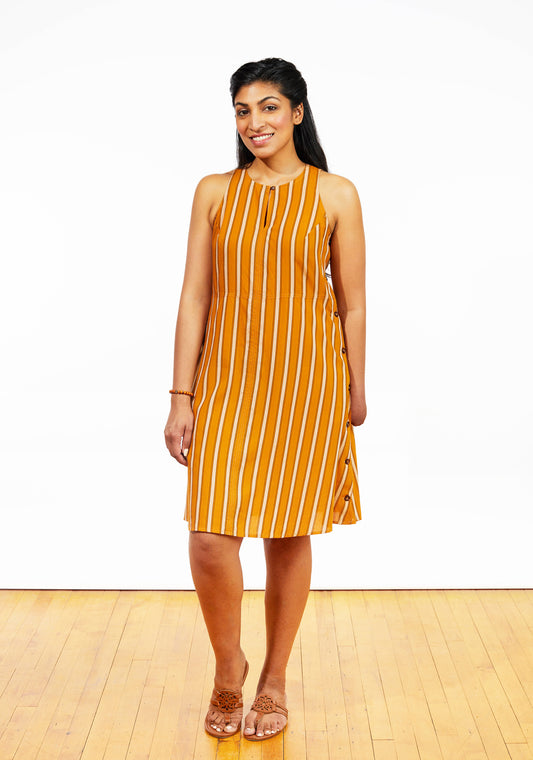 Front view of Austin Dress in orange stripe rayon with keyhole neckline, worn by model.