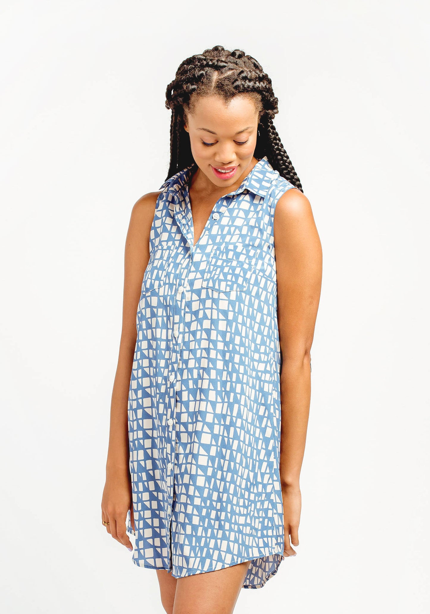 Angled view of blue printed Alder Shirtdress highlighting collar and front button placket.