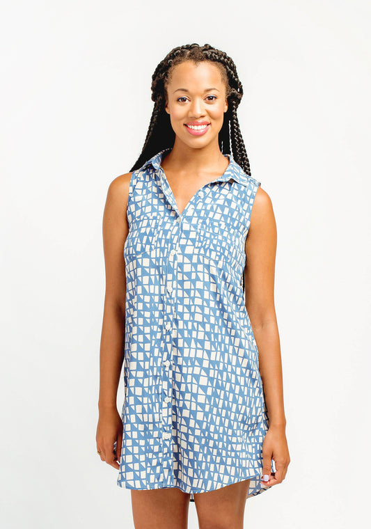 Front view of sleeveless blue printed Alder Shirtdress with button front and collar, worn by model.