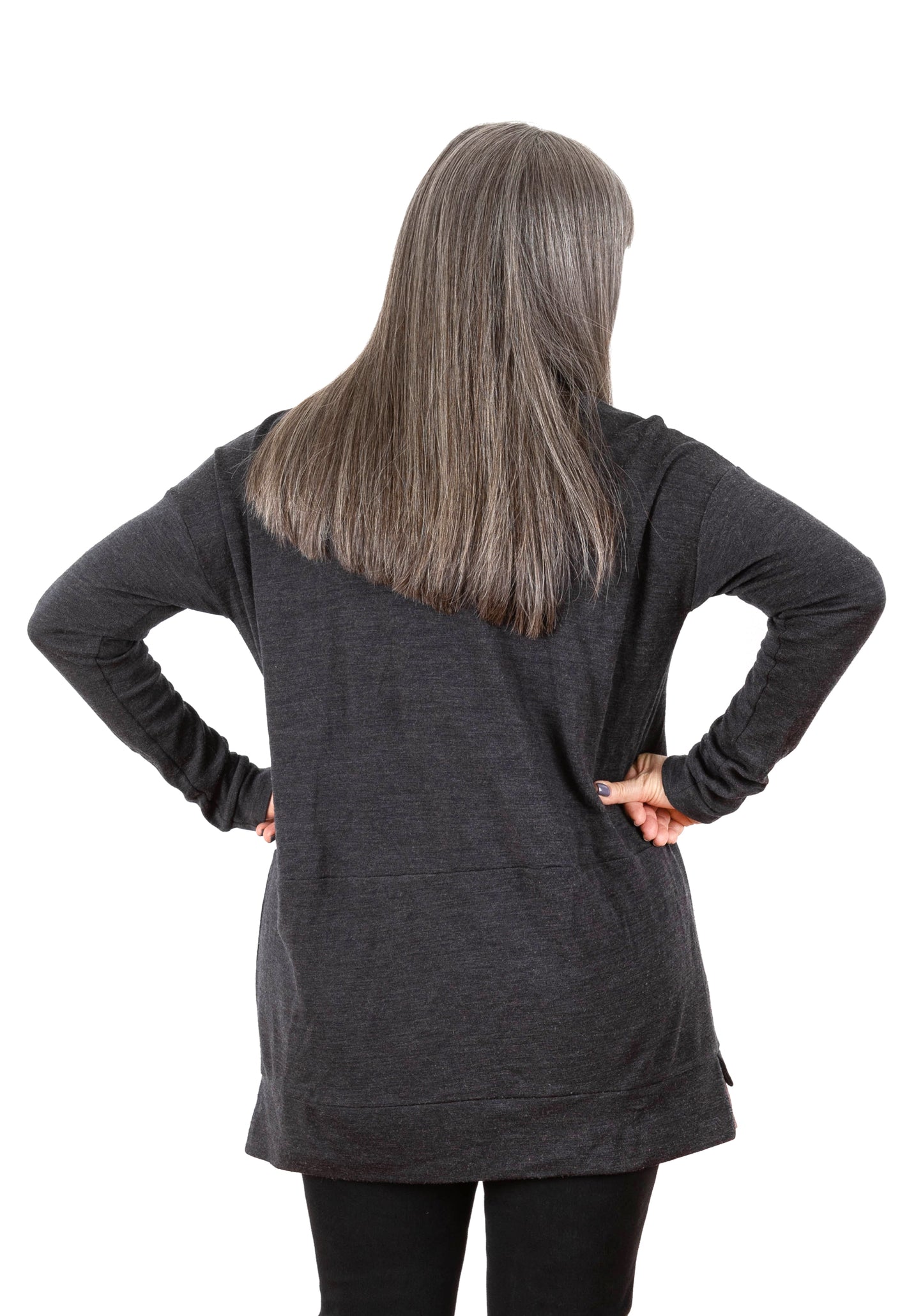 Three-quarter back view of charcoal Driftless Cardigan highlighting length and drape.