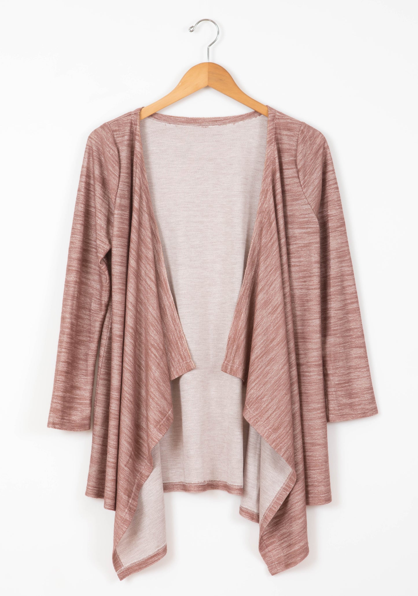 Flatlay of rose Lark Cardigan on hanger showing front opening and soft knit texture.