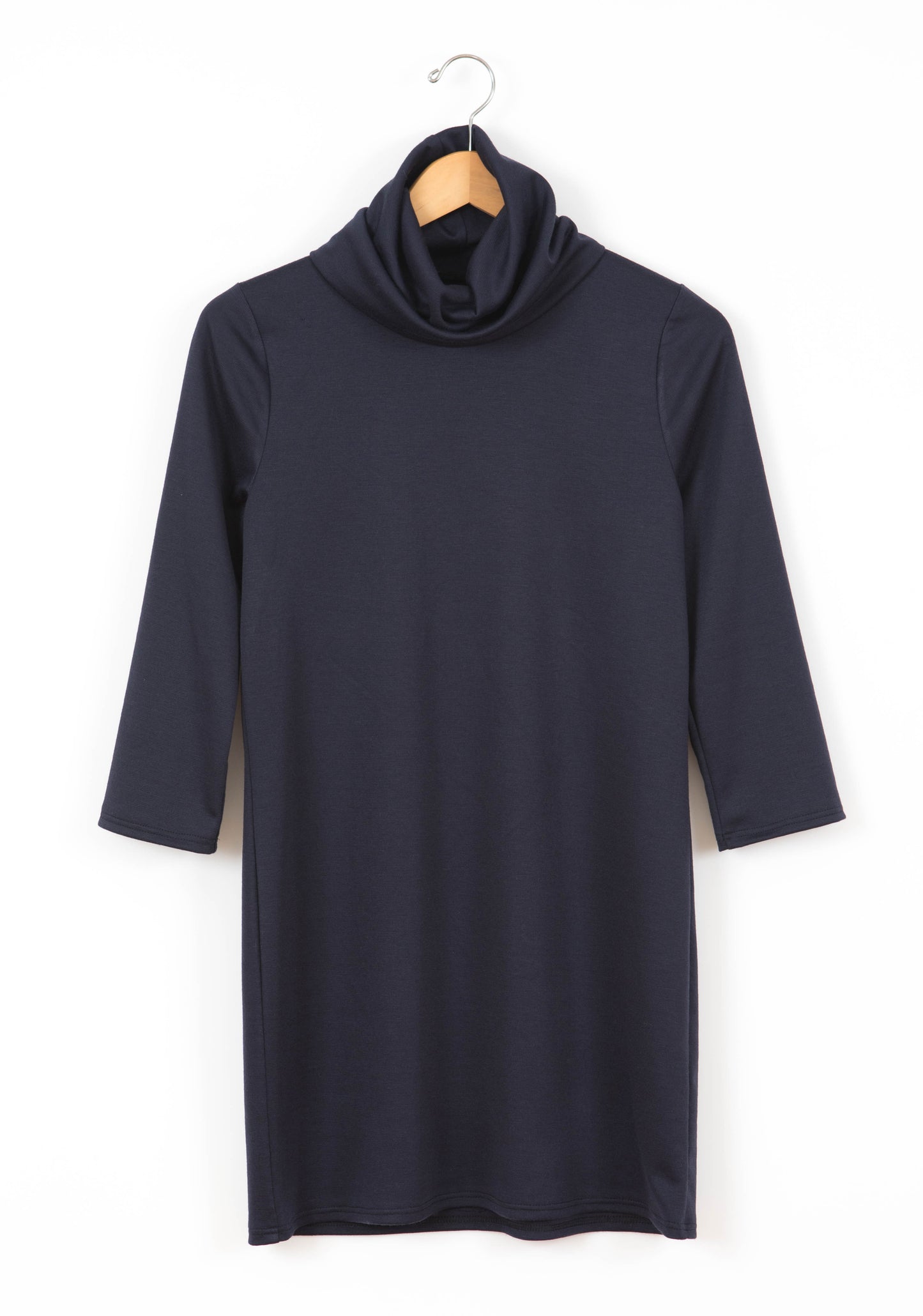 Flatlay of navy Lark Dress with cowl neckline and 3/4 sleeves.