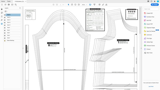 Screenshot of Uniform Tunic PDF pattern in Adobe Acrobat, showing layered pattern pieces for multiple sizes