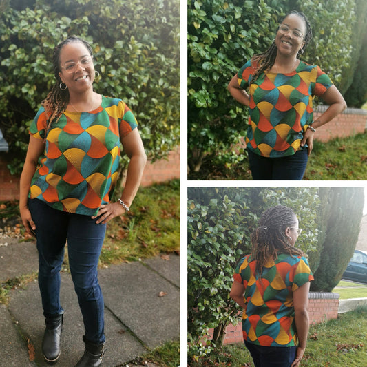 Scout Tee in multicolor geometric print with orange, yellow, teal, and green swirls, shown from three angles outdoors