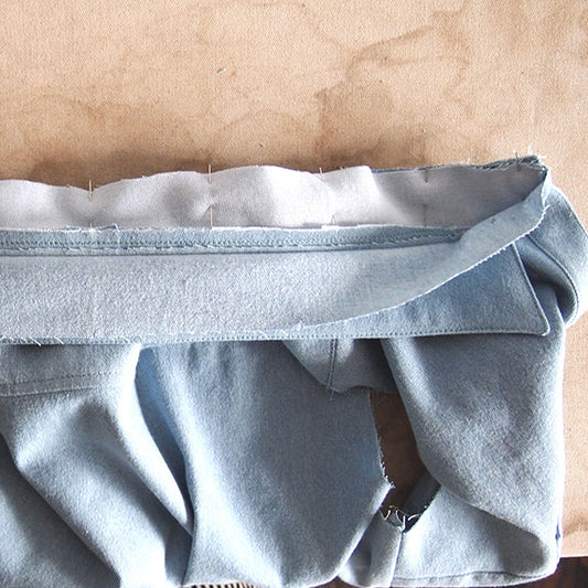 Alder Shirtdress band collar pieces pinned and stitched, showing graded seam allowances and trimmed corners before turning