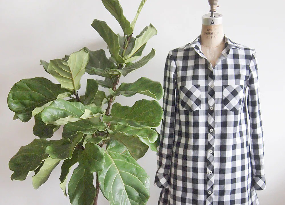 Archer-Alder hybrid dress on dress form in black and white buffalo check with long sleeves, collar, and breast pockets