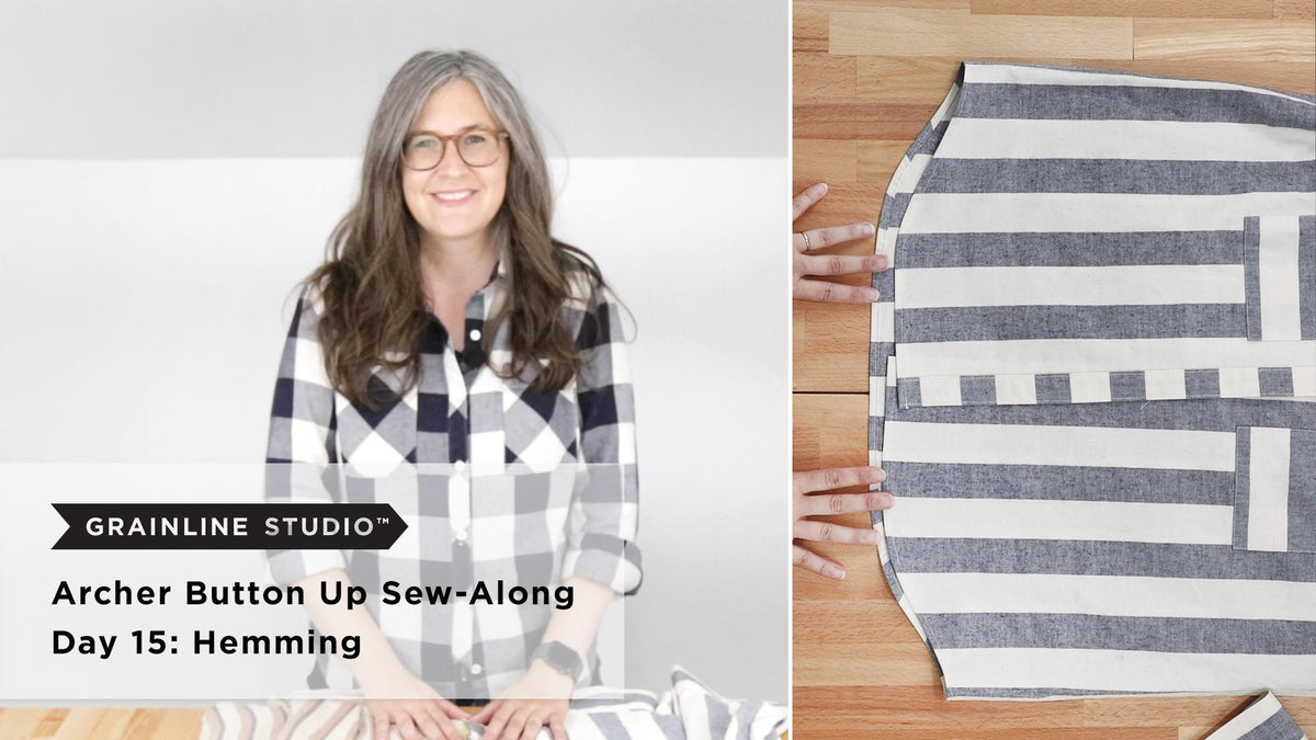 Woman smiling over striped fabric beside hands smoothing the curved shirttail hem of a navy and white striped Archer.