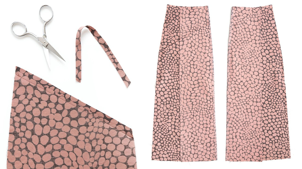 Reed Skirt View A construction progress: scissors and bias binding strips beside two skirt fronts with princess seams sewn