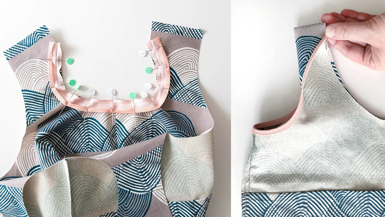 Stowe Bag handle with pink bias binding pinned around curves on left, hand demonstrating handle fold on right