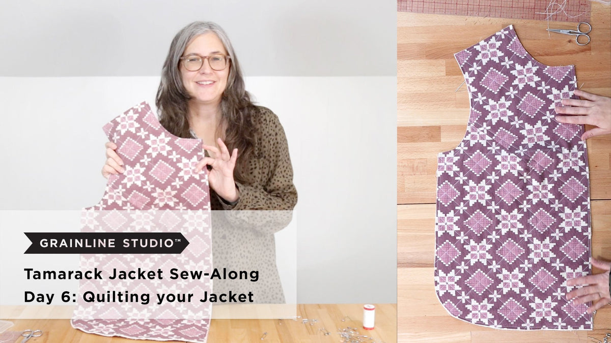 A completed quilted Tamarack jacket front piece in a mauve floral print held up showing diagonal quilting lines stitched across the full piece