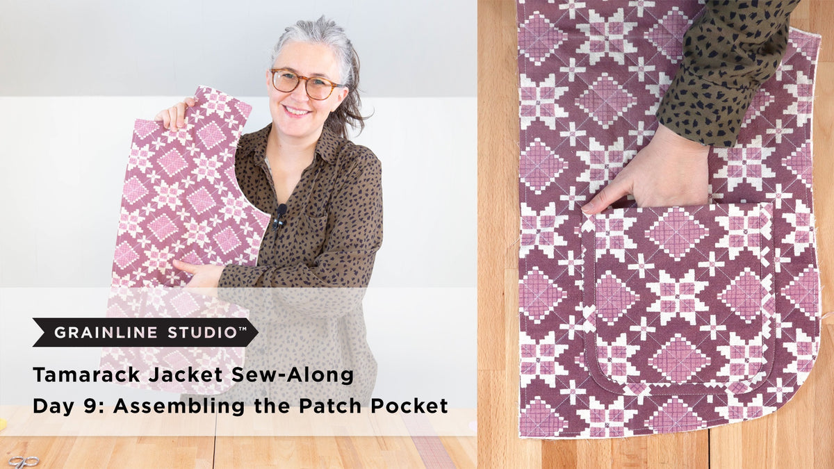 A hand slipping into a large quilted patch pocket on a Tamarack jacket front in a deep mauve floral print on a wood surface