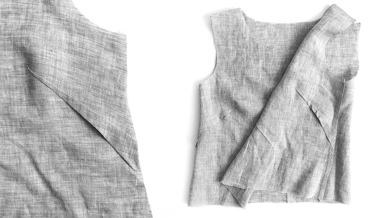 Close-up of sewn French dart on Uniform Tunic bodice and completed bodice front showing both darts pressed toward hem