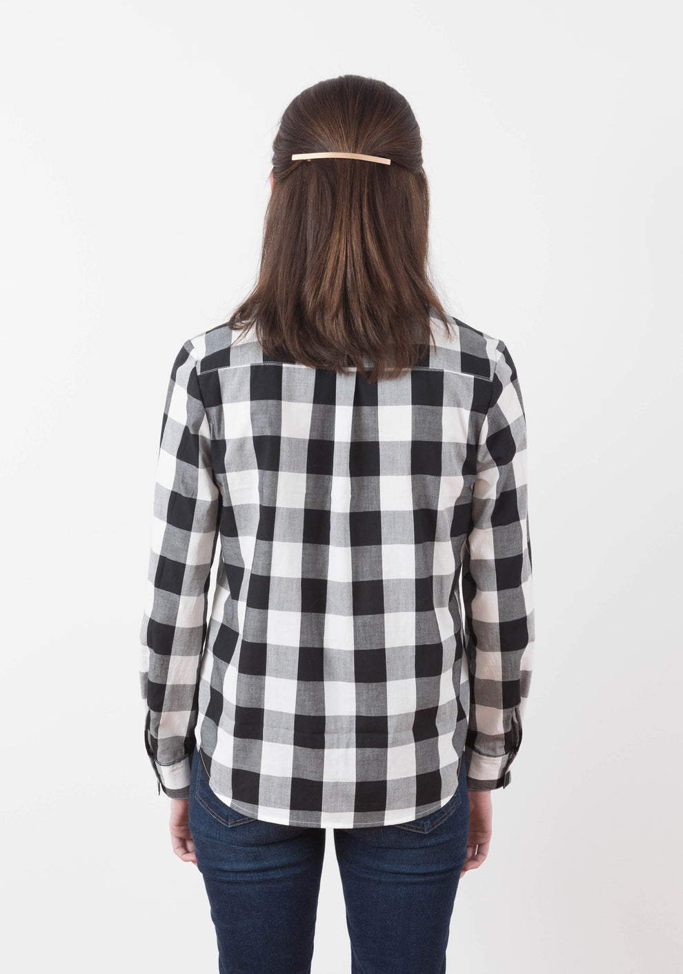 Back view of Archer View A shirt with center back pleat and yoke in black and white plaid cotton.