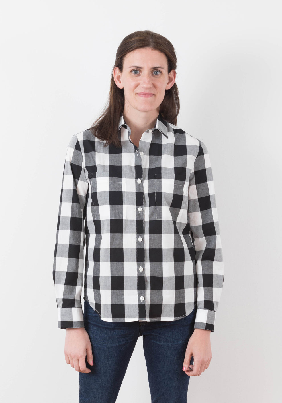 Model: Size 6, 5'8" | Person wearing black and white plaid Archer View A shirt, front view with collar, button band, and long sleeves.