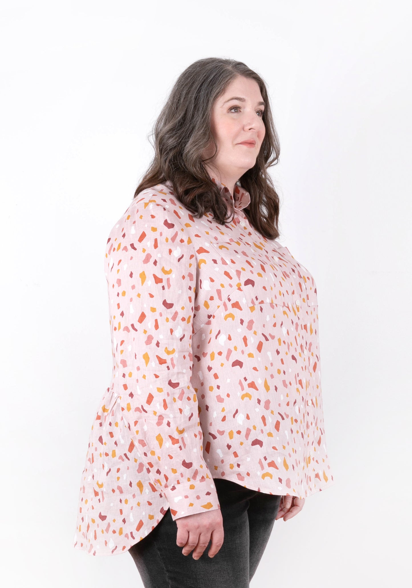 Archer Button Up View B, left side view with gathered back, pink print fabric, size 14-32.