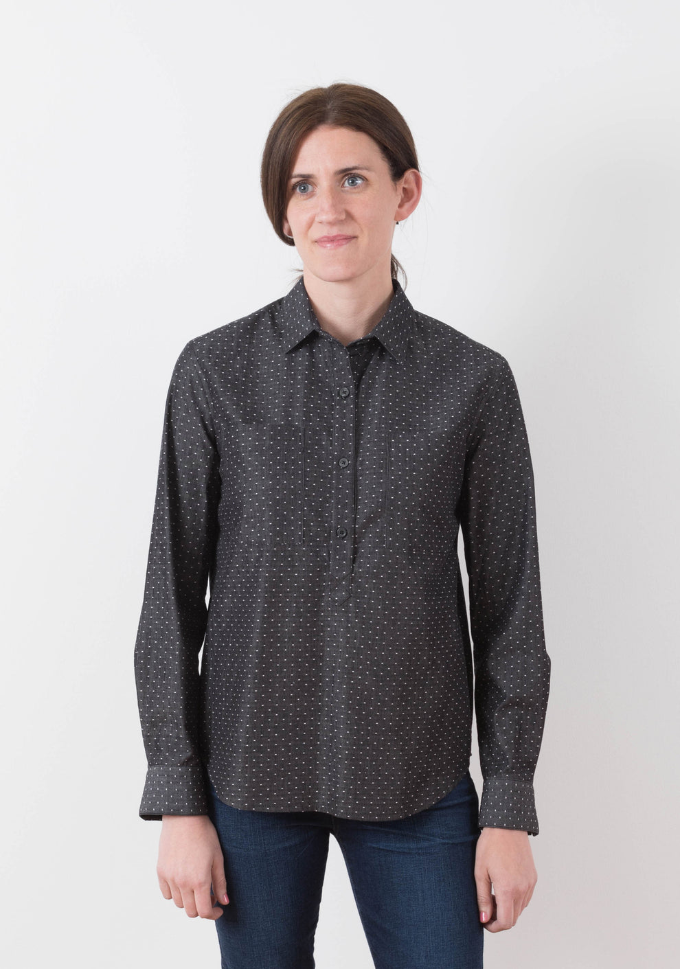 Model: Size 6, 5'8" | Person wearing the Archer Popover shirt, front view with long sleeves and partial placket.
