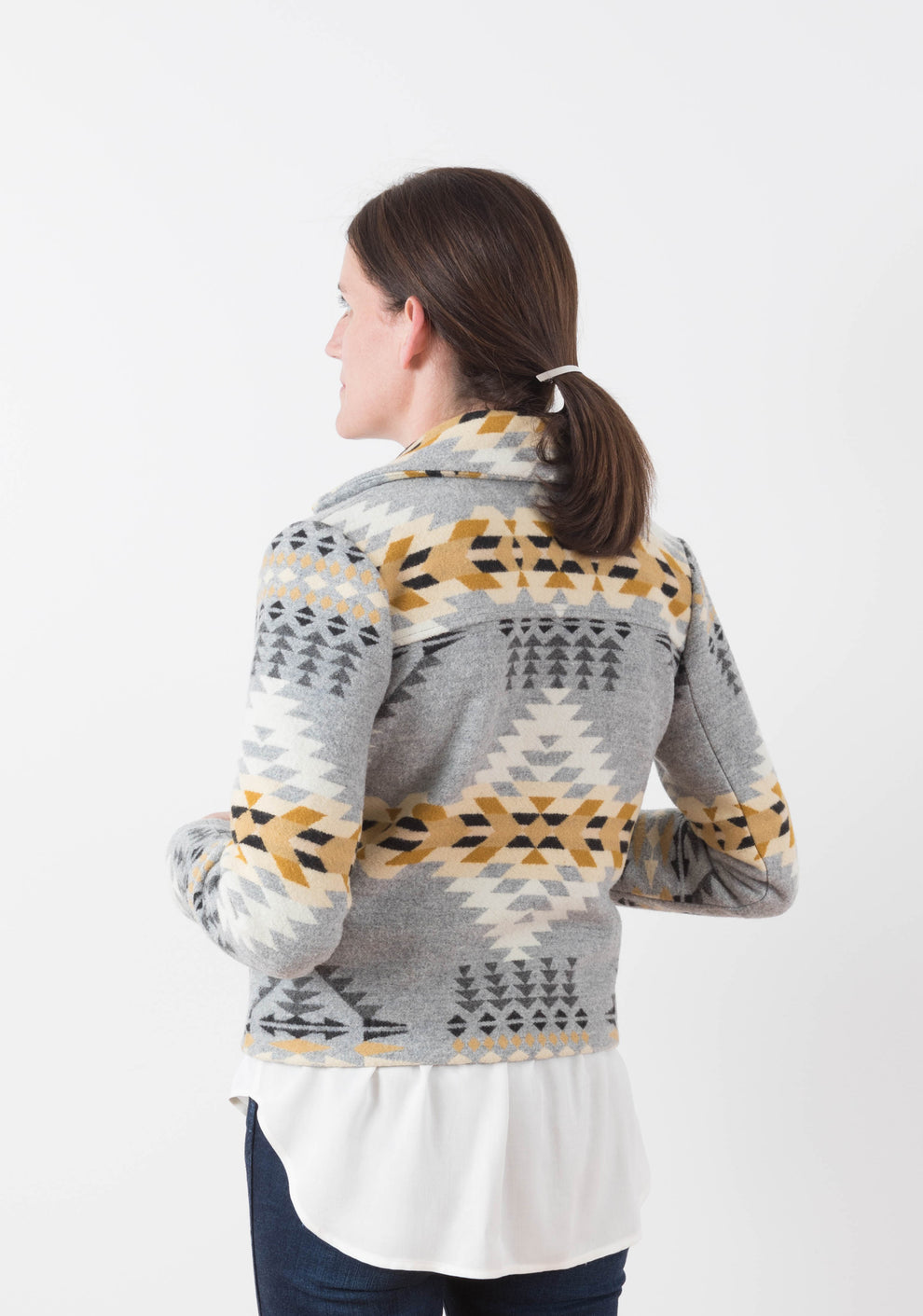 Back view of short Cascade Duffle Coat in grey and gold Pendleton wool with shaped back yoke and collar.
