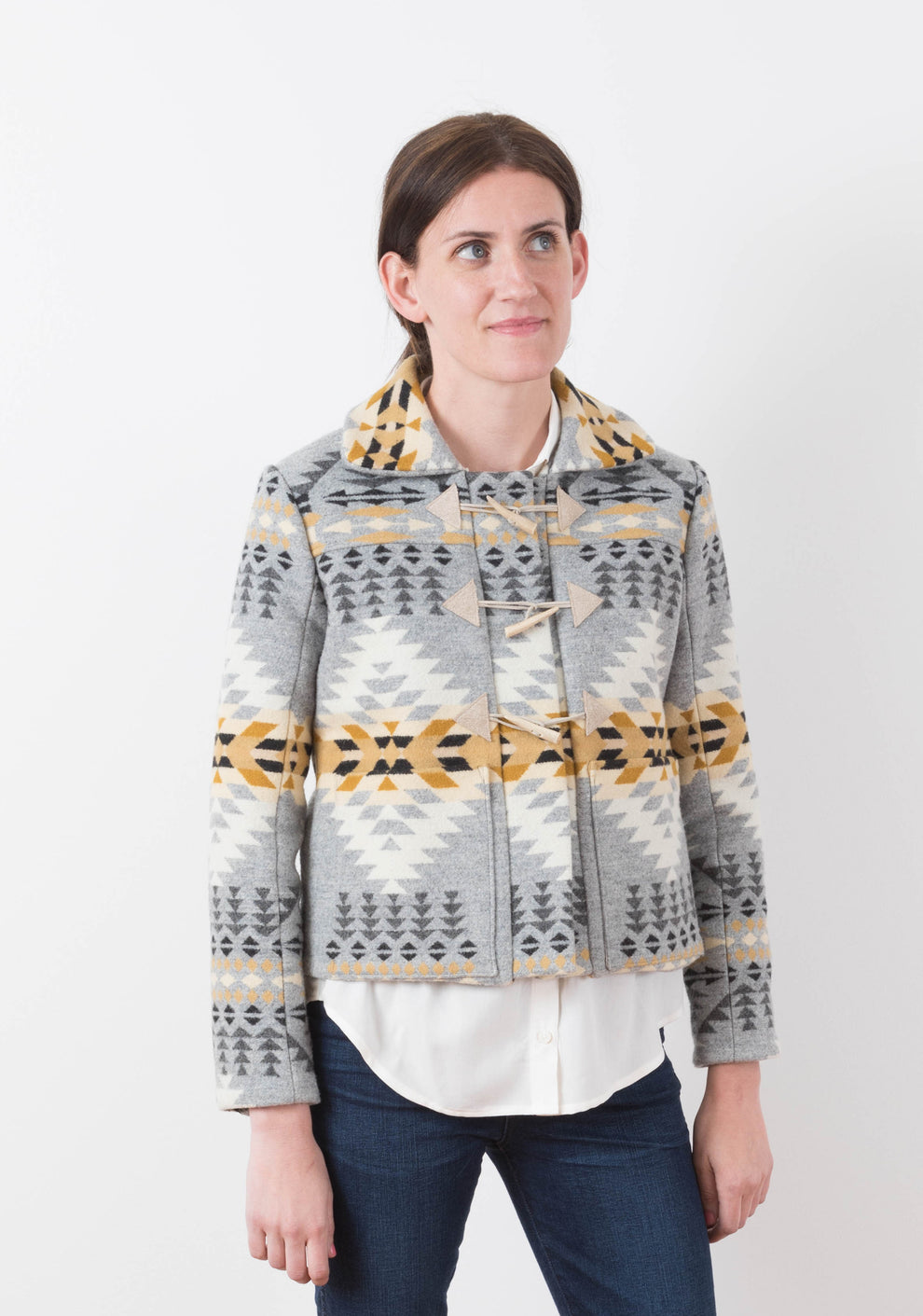 Front view of short Cascade Duffle Coat in grey and gold Pendleton wool with wooden toggles and collar.