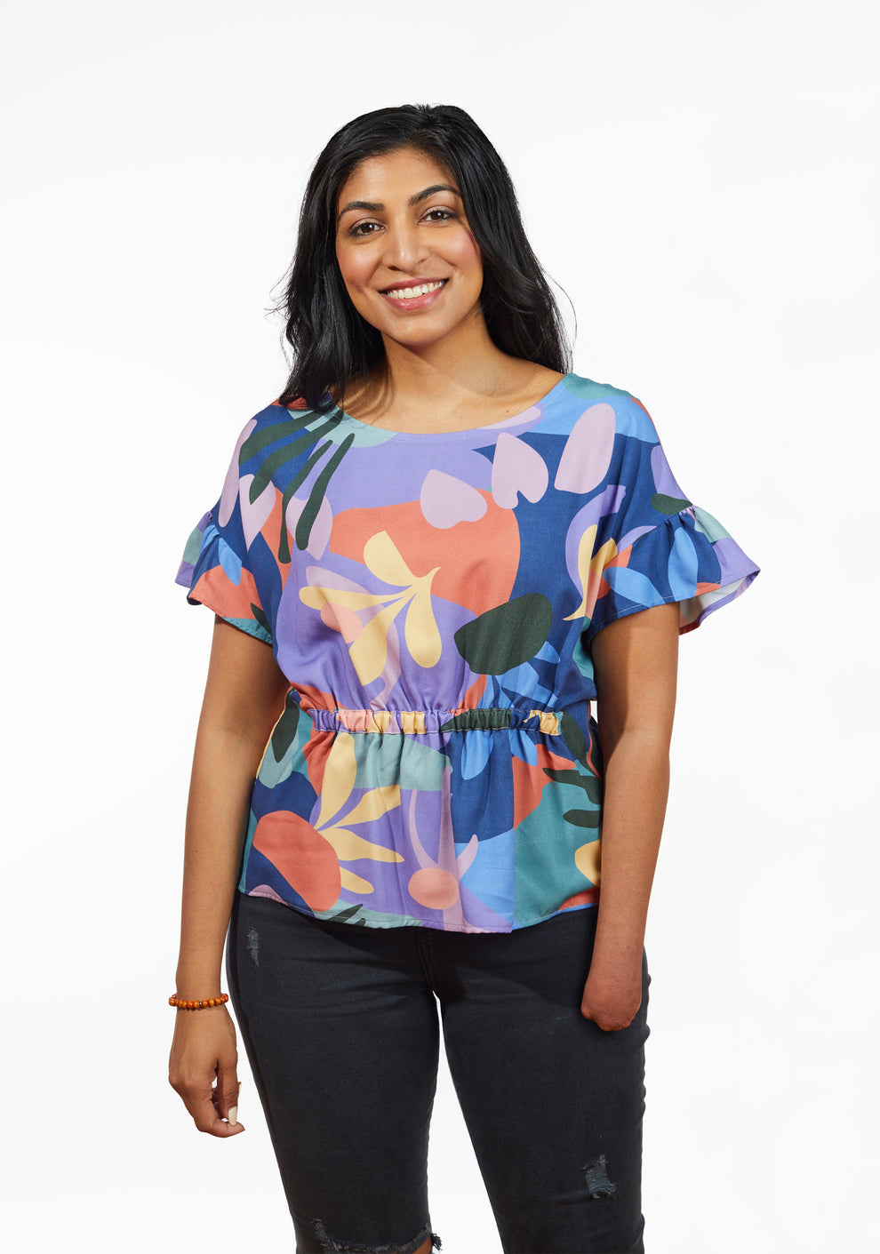 Front view of Corin Top in abstract floral print with short flutter sleeves and gathered waist.