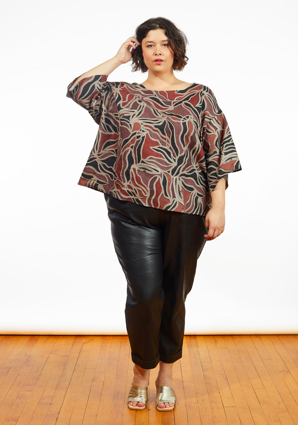 Front view of Corin Top in hand-printed batik fabric with elbow-length, drop shoulder sleeves and boxy silhouette.