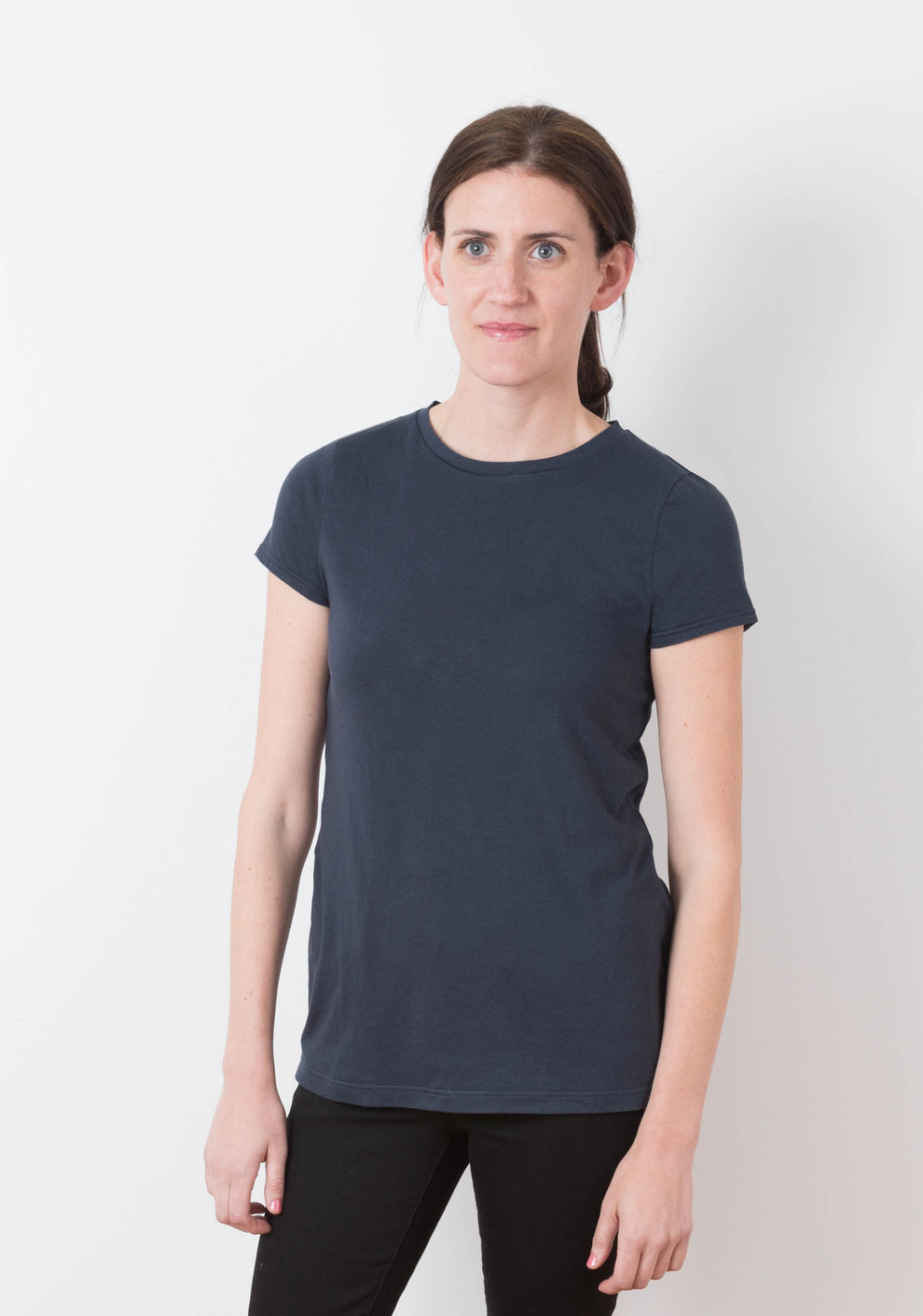 Model wearing Lark Tee with short sleeves and crew neckline, front view.