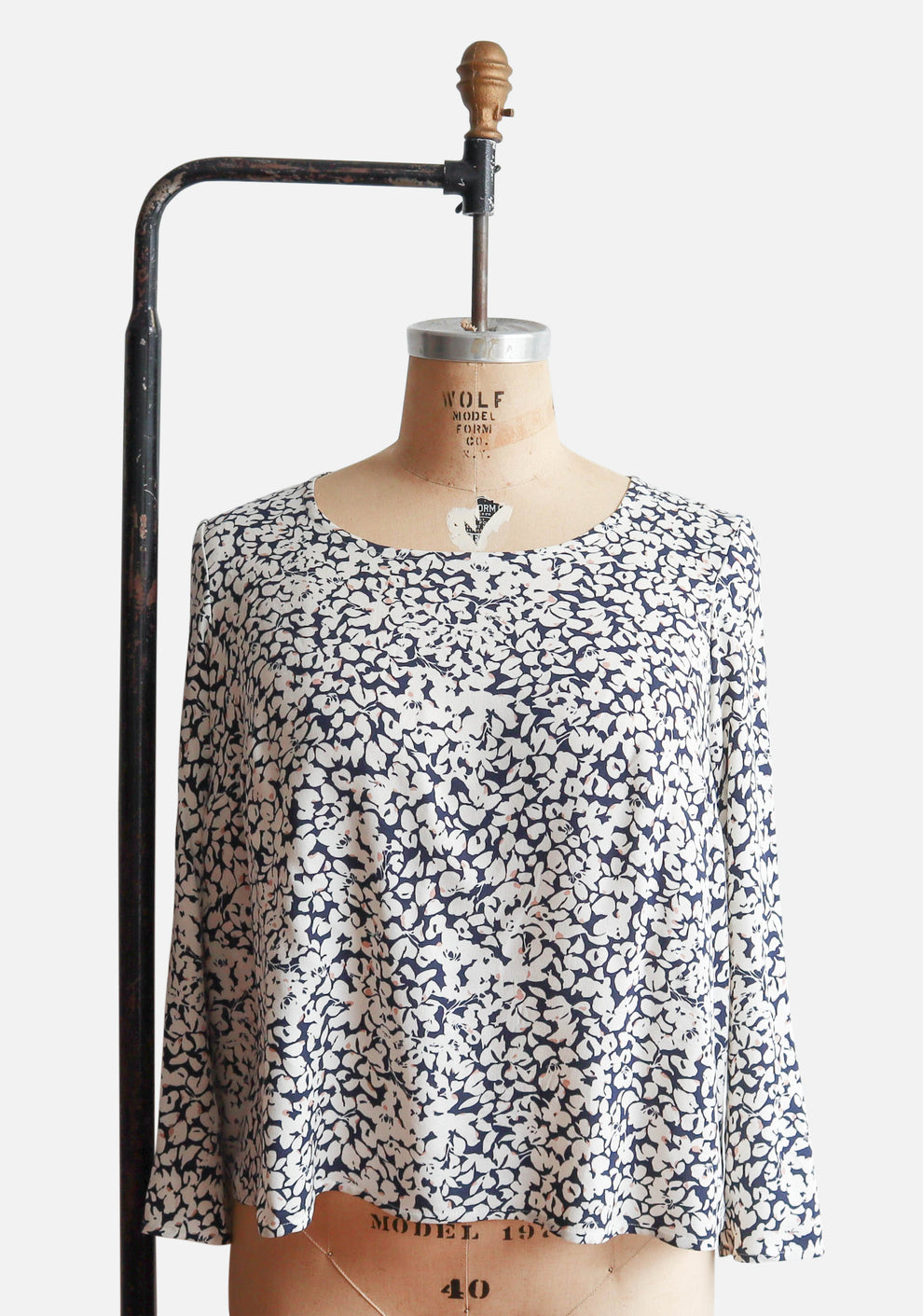 Scout Tee with long sleeves in navy and cream floral fabric, shown on dress form.