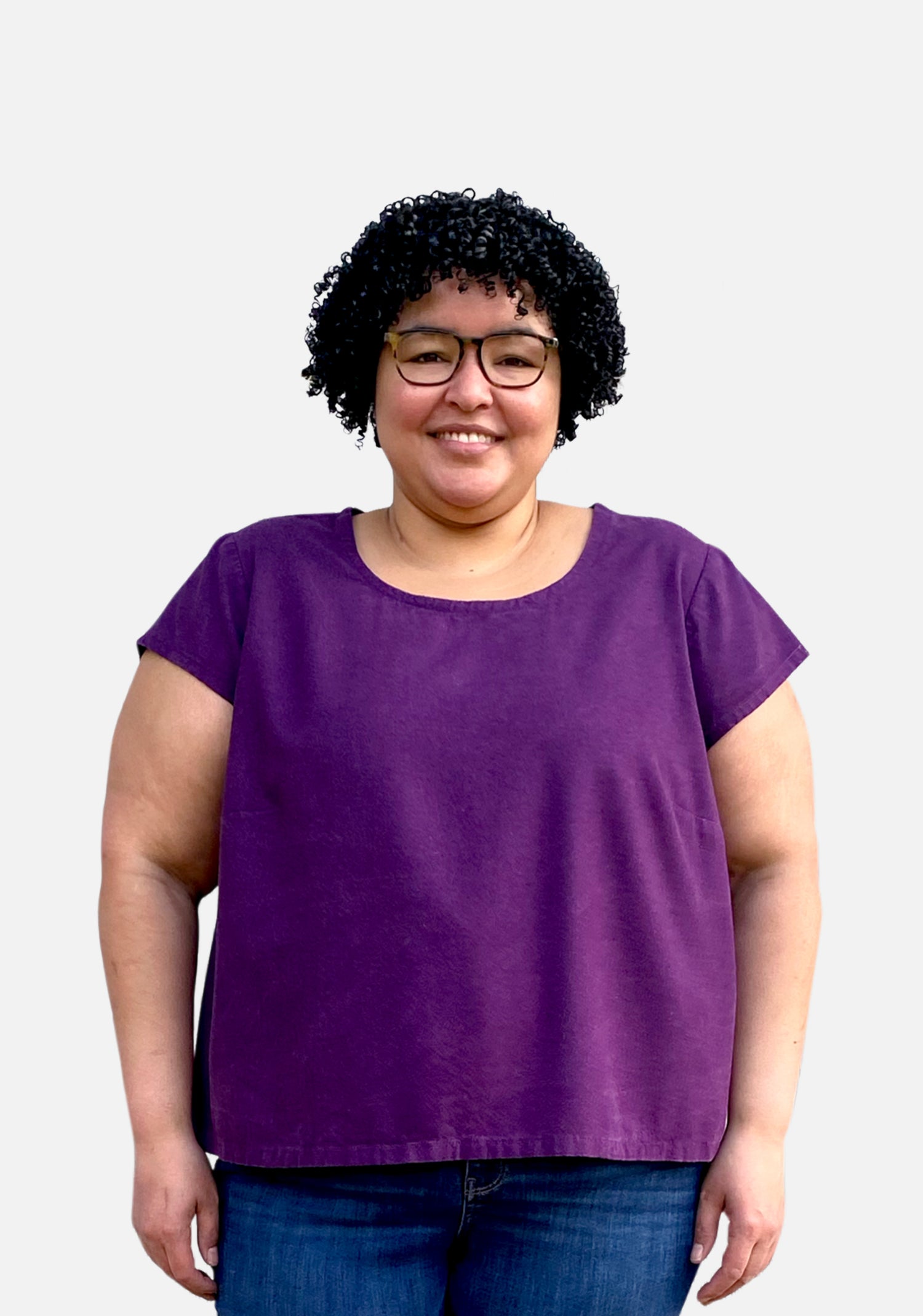 Model: Size 24, 5'5" | Model wearing a short-sleeved purple Scout Tee with a scoop neckline and relaxed fit, shown from the front.