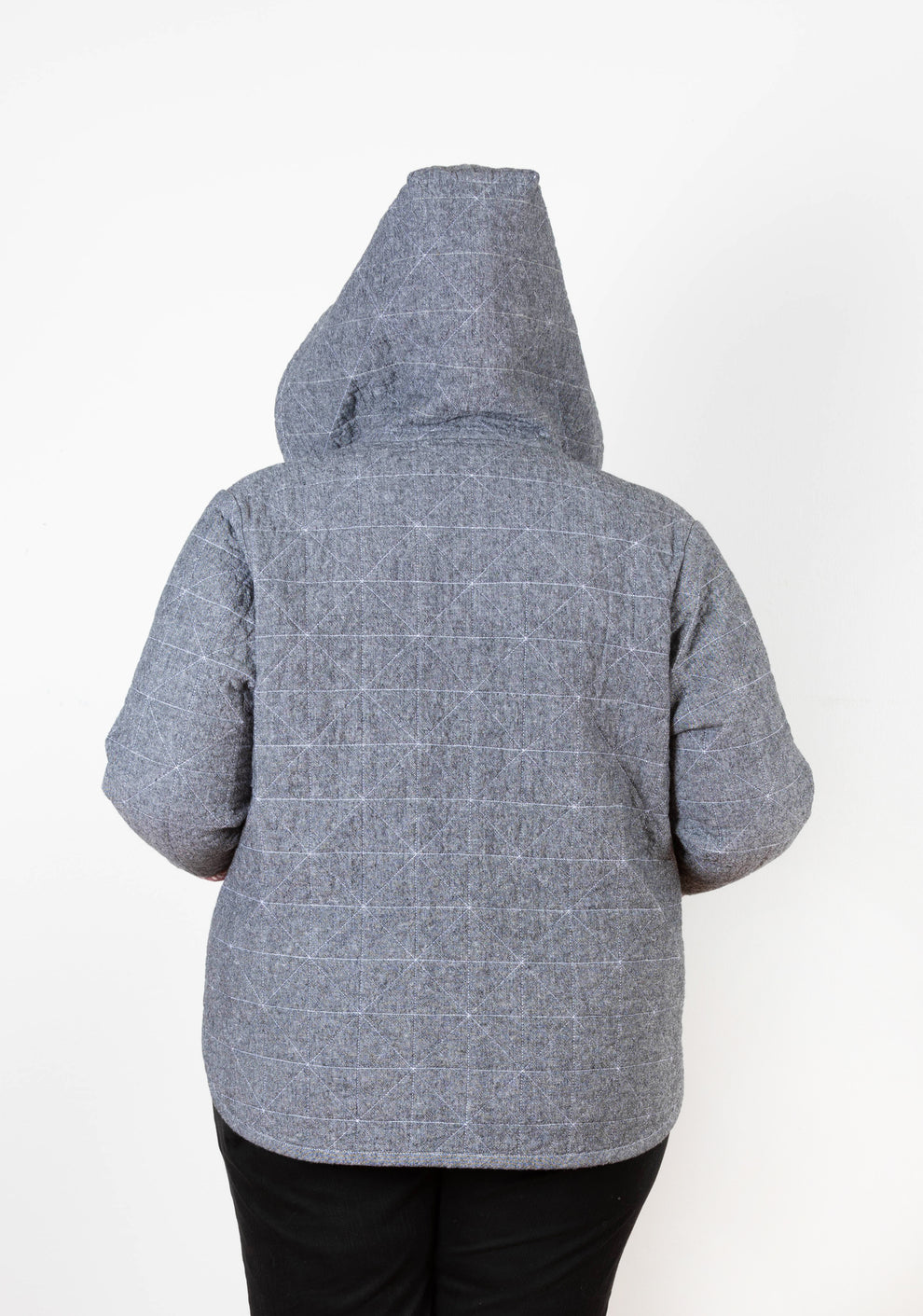 Back view of gray Tamarack Jacket with hood add-on and geometric quilting, size 0-32.