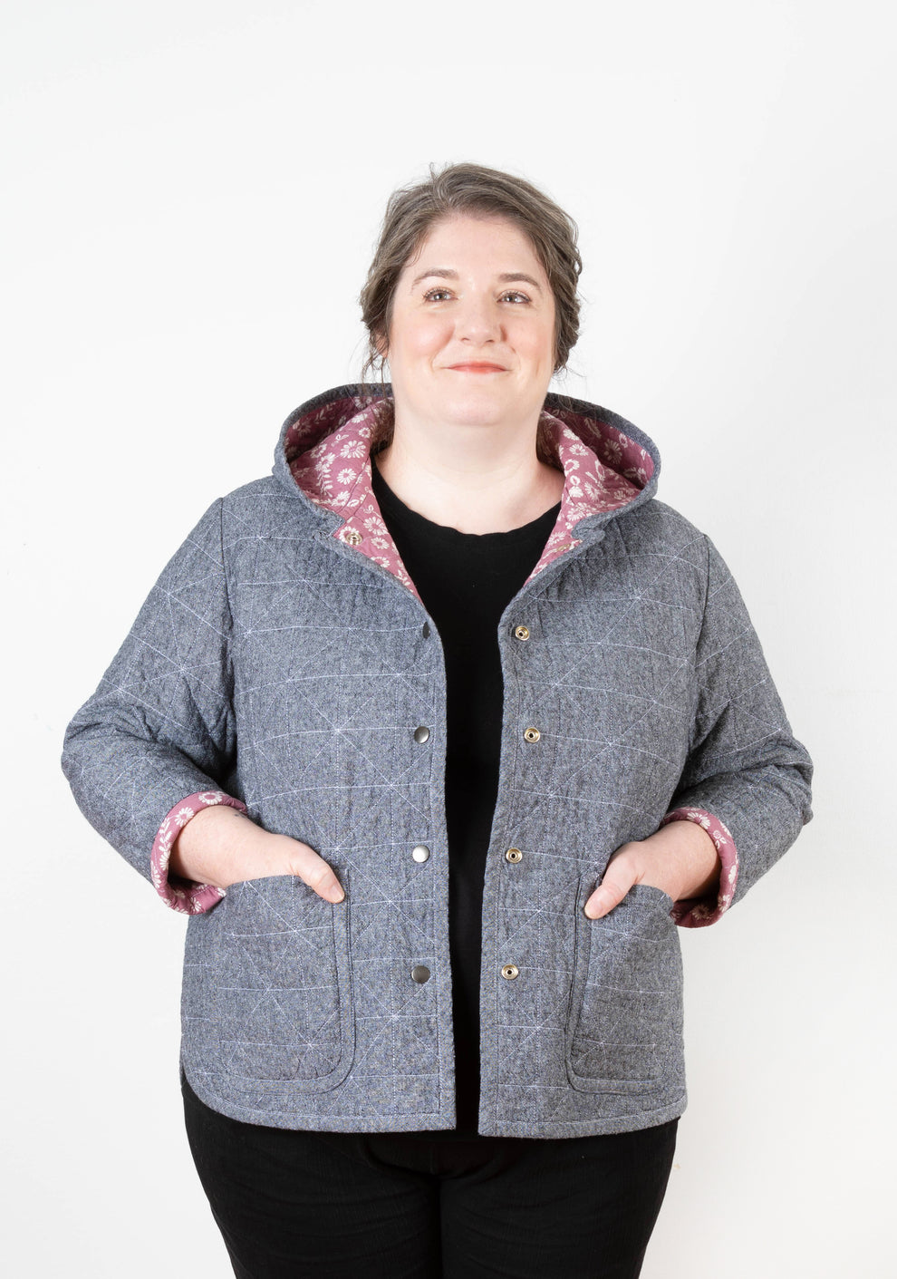 Model: Size 20, 5'5" | Front view of model wearing Tamarack Jacket in orange stripes with collar add-on, hands in pockets.