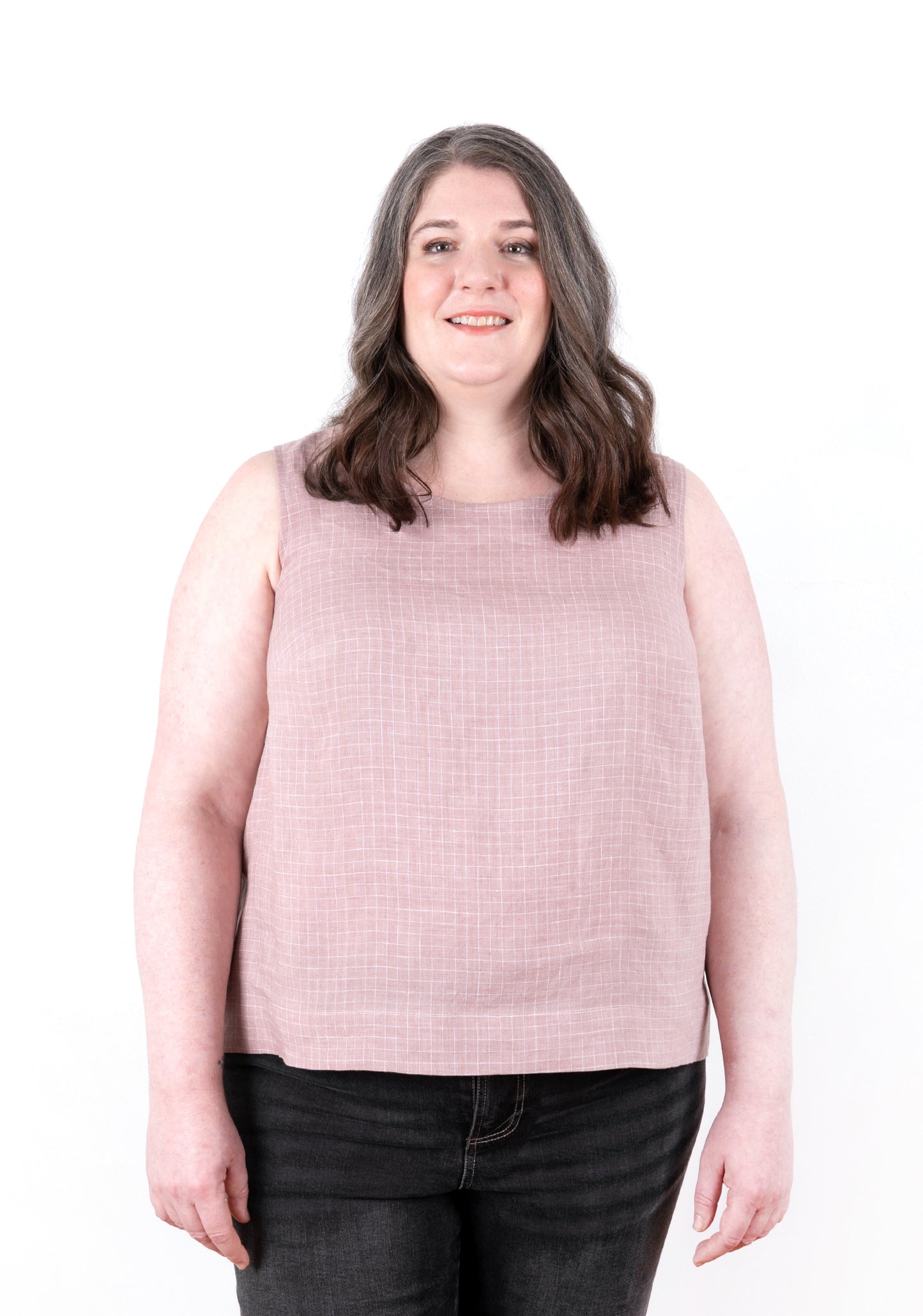 Front view of model wearing pink check Willow Tank showing clean lines and relaxed fit.