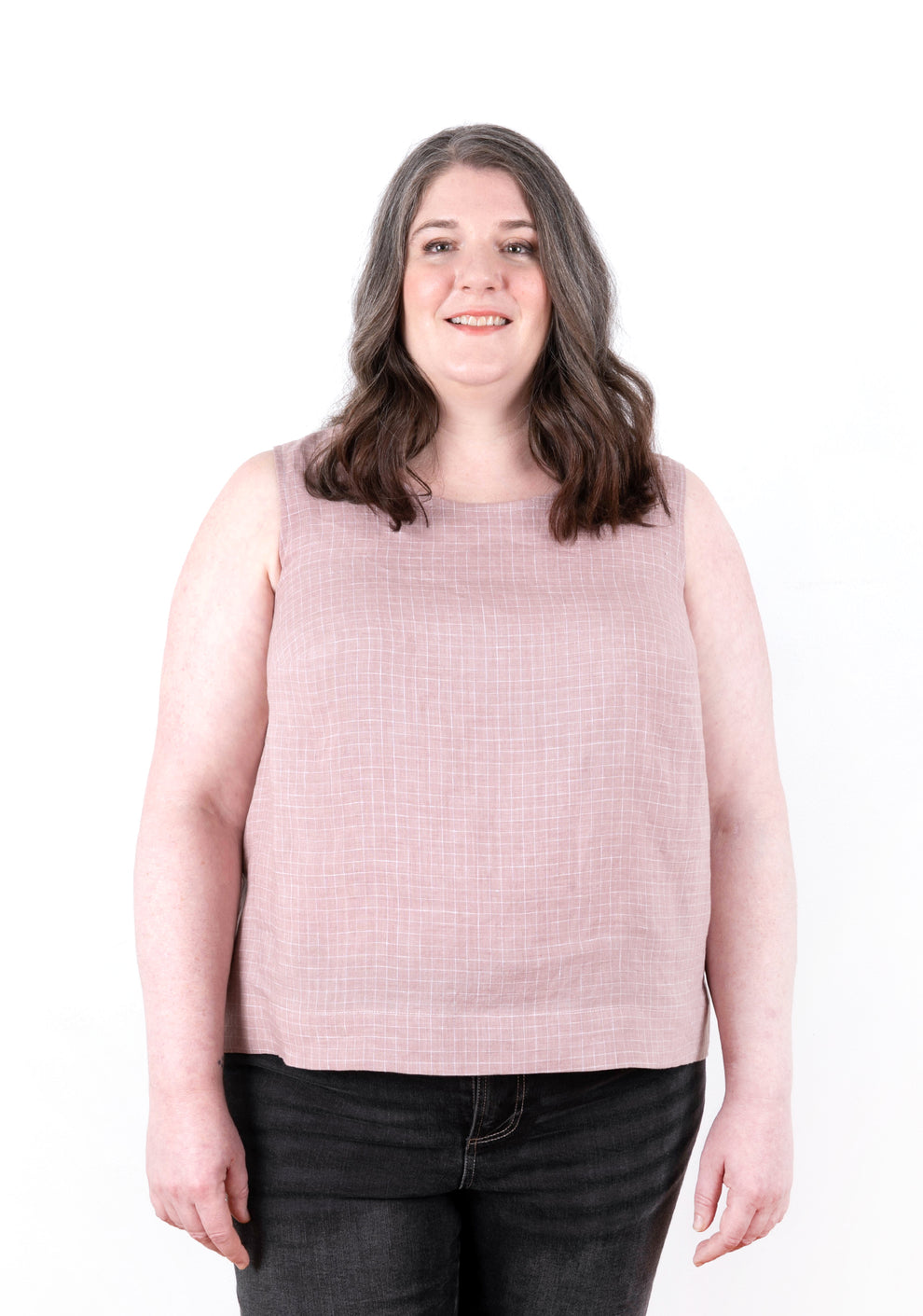 Front view of model wearing pink check Willow Tank showing clean lines and relaxed fit.